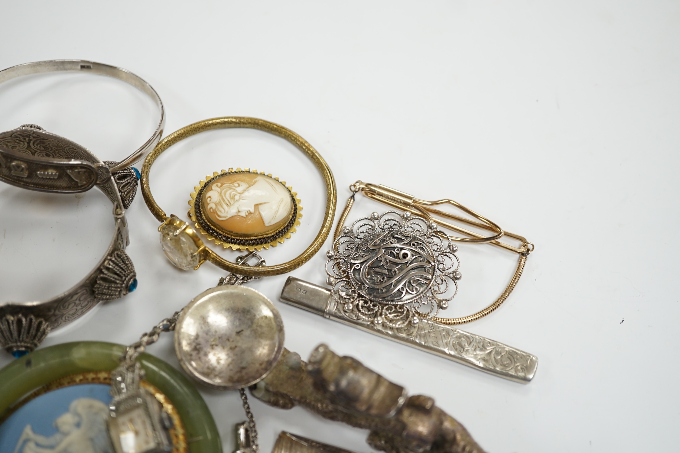 A collection of white metal and mixed costume jewellery, including bracelets, necklaces, bangles etc and a silver cased pair of scissors.